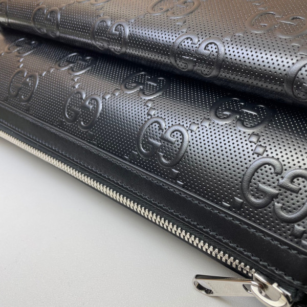 G*u*i gg embossed messenger bag