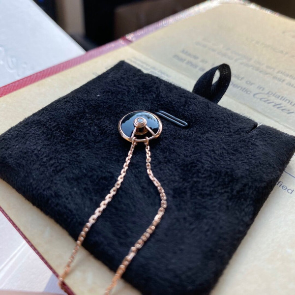 Ca*t*er amulet necklace