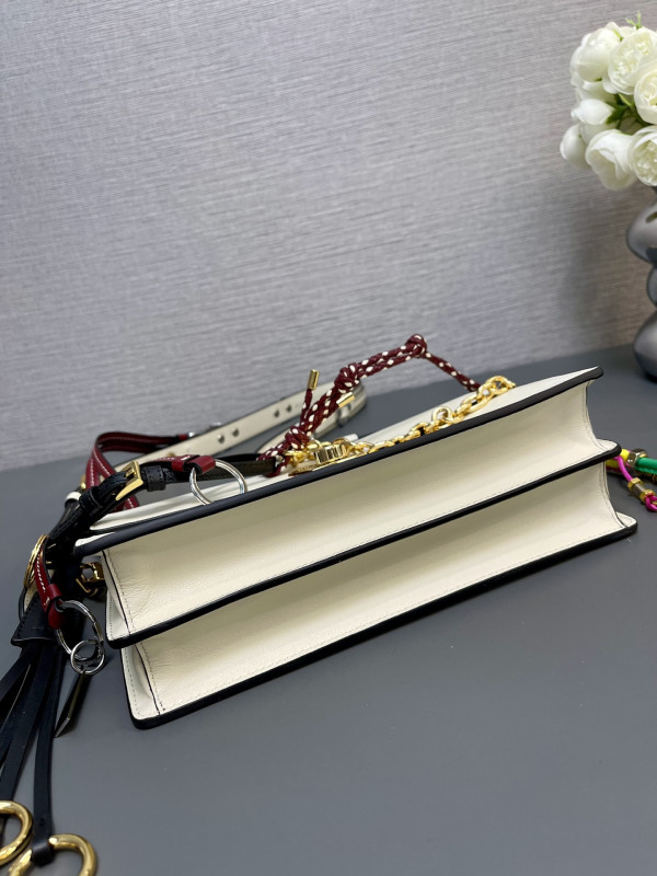 Pra*a soft sound small leather shoulder bag with charms